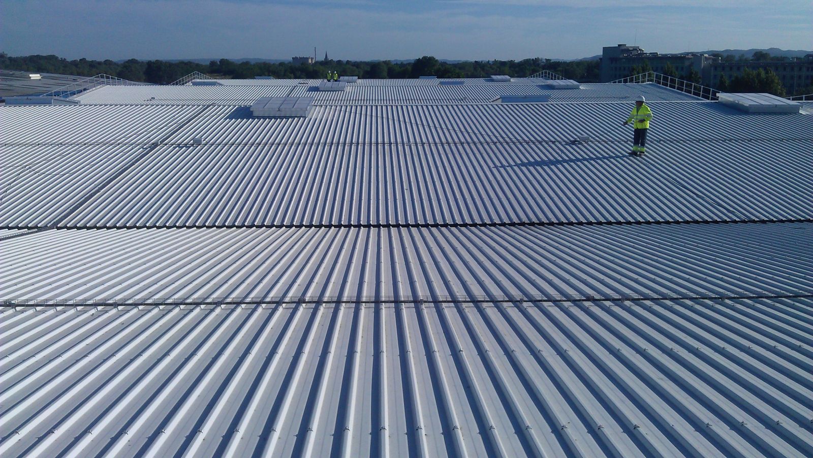 Simple roofing with special coating HDX-55 both faces to a compost industry in Tarascon (France)